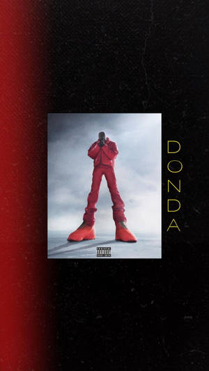 DONDA 專輯封面，一個穿紅衣的男人站在灰色平台上。