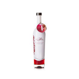 白色La Pinta石榴利口酒瓶，帶有紅色液體和裝飾標籤。