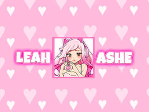 粉紅色頭髮的動漫女孩在Leah和Ashe名字之間用雙手做出心形。