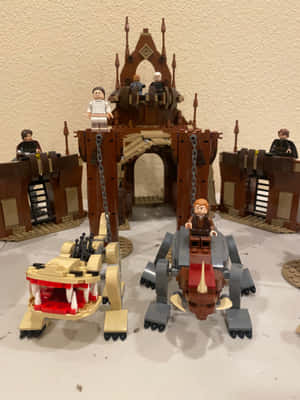 LEGO Star Wars 城堡連同人仔及兩部飛梭賽車。 — iPad Air 13 壁紙