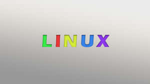 灰色漸變背景上的彩虹色 Linux 文字。