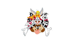 一群Looney Tunes卡通角色微笑並一起擺姿勢。