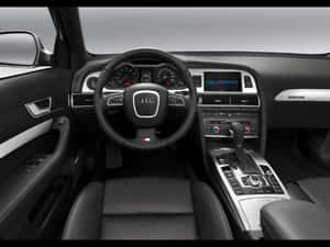 黑色皮革奧迪車內飾，帶銀色飾邊和數字顯示屏。 — Audi R8 GIF 壁紙