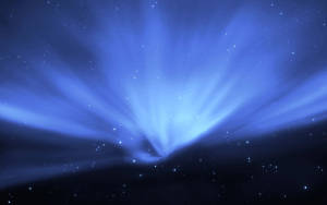 明亮的藍色宇宙爆炸，光芒穿過星空。