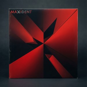 紅黑幾何專輯封面，帶有「MAXIDENT」文字。