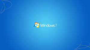 Windows 7 標誌在帶有裝飾性漩渦的藍色漸變背景上。