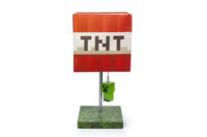 Minecraft TNT燈，帶有懸掛在像素底座上的Creeper公仔。