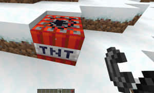 玩家在Minecraft中靠近被雪覆蓋的TNT方塊手持打火石。