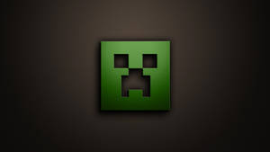 深色背景上的綠色 Minecraft 爬行者面孔標誌