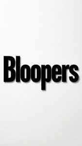 白色牆上帶陰影嘅粗體黑色文字「Bloopers」