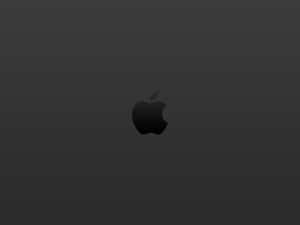 深灰色漸變背景上的黑色Apple標誌