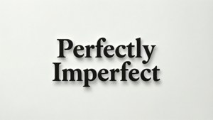 粗體黑色3D文字寫著「Perfectly Imperfect」，在純米白色背景上。