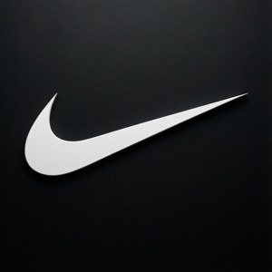 白色Nike swoosh標誌在黑色紋理背景上