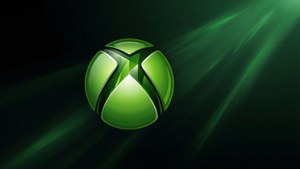 深色背景上帶有光線的發光綠色Xbox標誌