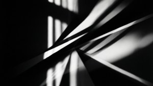 交叉光束和陰影的抽象黑白圖案