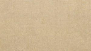 米色粗麻布特寫，顯示編織紋理和天然纖維