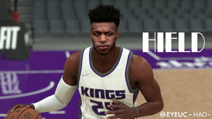 身穿白色Kings球衣的籃球運動員在球場上持球。 — 科比· Bryant 壁紙