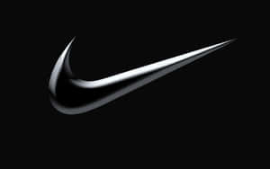 純黑色背景上的時尚金屬Nike勾號標誌