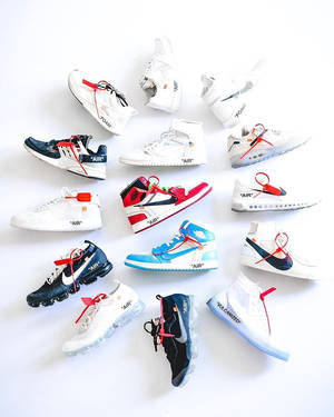 在白色表面上展示的各種Off White Nike運動鞋。