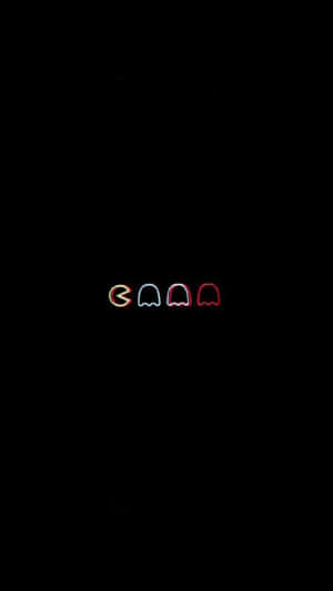 霓虹 Pac-Man 和鬼魂在黑色背景上發光。