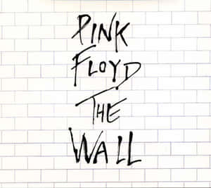 Pink Floyd The Wall 專輯封面，白色瓷磚上有手寫文字。