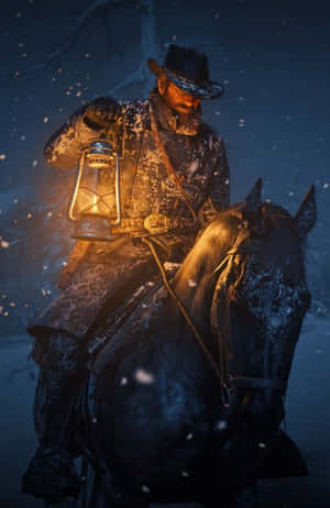 雪夜中騎馬持燈籠的男人