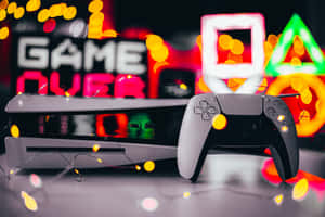 PlayStation主機和控制器，帶有發光燈光和遊戲結束標誌。 — MacBook Pro M2 壁紙
