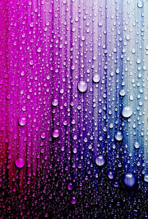 玻璃上的雨滴，背景為洋紅色到青色漸變