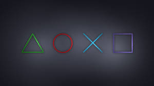 PlayStation控制器按鈕在深色背景上發出綠色、紅色、藍色和紫色光芒