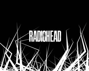Radiohead 樂隊標誌，黑色背景上有白色抽象線條
