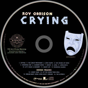 Roy Orbison專輯《Crying》的黑色CD標籤，帶有白色文字和哭泣面具。