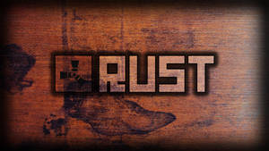 Rust 遊戲標誌，背景為帶有深色污漬的破舊木質表面。 — 木紋 壁紙