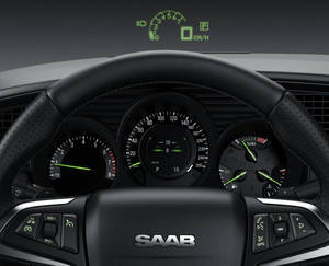 Saab 汽車內飾儀表板，帶有發光的綠色儀表和控制器。