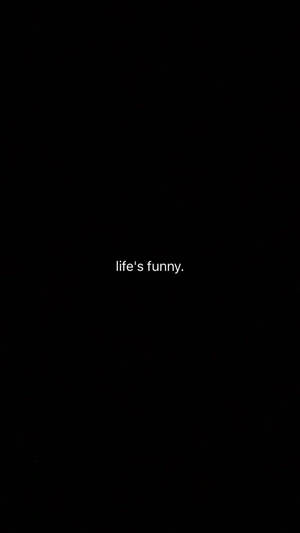 黑色背景，白色文字顯示 life's funny。