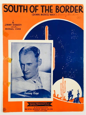 1940年代復古樂譜封面， 《South of the Border》， 有 Sammy Kaye 的肖像和沙漠場景。