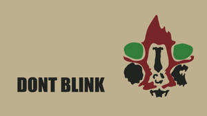帶有文字 dont blink 和風格化臉部設計的警告圖形。 — 雕塑 壁紙