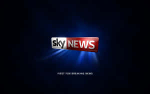 帶有藍色光線和標語 first for breaking news 的 Sky News 標誌 — 藍天 壁紙