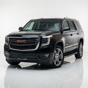 黑色GMC Yukon Denali SUV在攝影棚中，帶有鍍鉻飾邊和光澤反射。