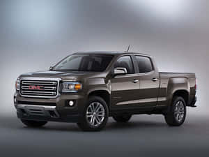 工作室燈光下的棕色GMC Canyon皮卡車 — 林寶堅尼貨車 壁紙