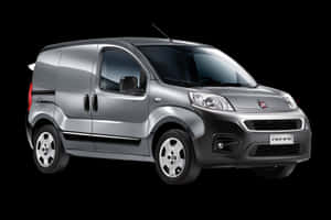 銀色 Fiat Fiorino 商用客貨車在黑色背景下的攝影棚燈光中。 — MacBook Air 13 壁紙