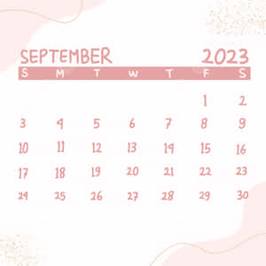 2023年9月日曆，配有粉紅色文字和抽象水彩設計。