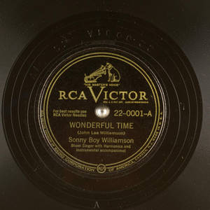 復古RCA Victor黑膠唱片標籤，帶有金色文字和Nipper狗標誌。 — 音樂 GIF 壁紙