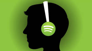 戴著耳機嘅人，耳罩上有Spotify標誌，綠色背景