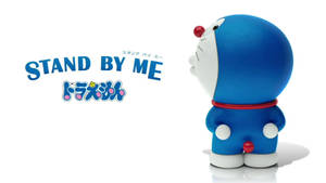 藍色機械貓多啦A夢玩具，白色背景上帶有「STAND BY ME」文字。