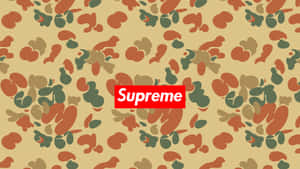 抽象迷彩背景上的紅色Supreme標誌。