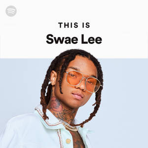 Swae Lee 戴住橙色眼鏡同淺藍色恤衫，紋身清晰可見。 — Brandon lee GIF 壁紙