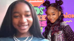 年輕女孩在Nickelodeon Kids' Choice Awards穿著閃亮外套微笑。