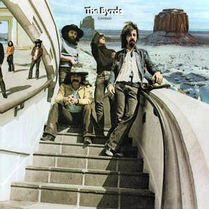 The Byrds 樂隊在沙漠景觀中的彎曲樓梯上。 — 岩石 壁紙