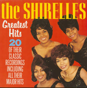 The Shirelles Greatest Hits 的復古專輯封面，四位微笑的女性身穿黑色亮片上衣。 — 音樂 GIF 壁紙