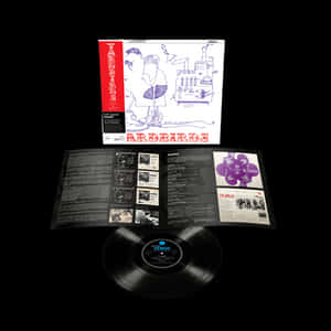 Yardbirds 黑膠唱片，帶有打開的內套和專輯封面，背景為黑色。 — 音樂 GIF 壁紙